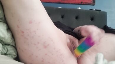She squirts then sticks rainbow dildo deep in Swedish teen solo