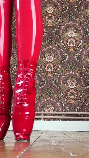 Red Ballet Boots on Wooden Floor