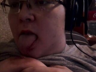 Licking own teat
