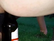 pissing and fucking a bottle in the park