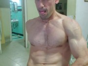 Fitness enthusiast guy makes crazy faces while enjoying and reaching orgasm