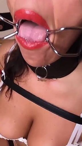 Latina Tied up with Belts and Gagged with a Ring Gag (smaller Size)