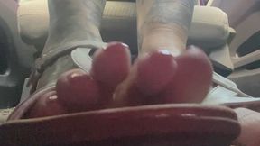 Toes in white sandals