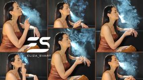 Full clip only nose exhales: smoking in a brown leather dress and boots