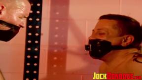 ”Bigg Pete & Dominik Mann are both tied in anguish with their nipples clipped”