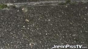 ”Wicked  Japanese babe is peeing in front of her house”