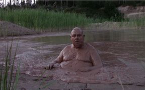 Mud Bath in Deep Quarry Mud Pond