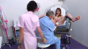 Red haired cutie gets her pussy fingered at a gyno