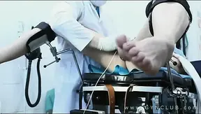 Doctor administers a hardcore gyno exam