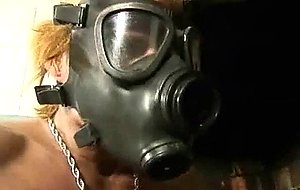 Stranger in gas mask penetrates a ts
