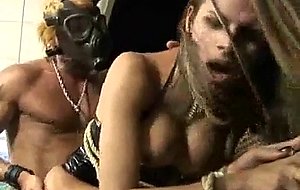 Stranger in gas mask penetrates a ts