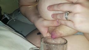 Mom enjoys a horny moment with her son while lactating.