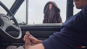 Brunette babe gives hot handjob in public parking lot