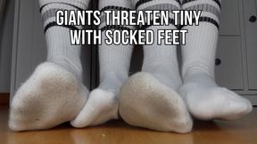 Giants threaten tiny with socked feet (white cotton socks) - Lalo Cortez and Vanessa