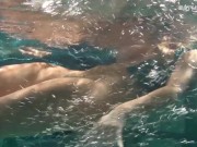 Blonde Feher with big firm tits underwater
