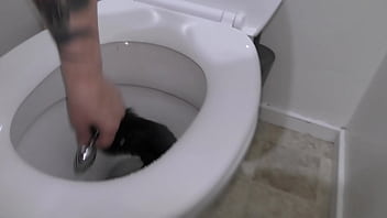 Trashy Kiwi MILF retrieves and reinserts Butt Plug tail after it falls out while pissing in the toilet