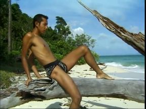 Hot little Asian guy jacks off on the beach by himself