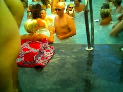 Voyeur finds stunning mature babes enjoying a nudist party