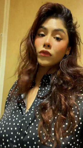 Woman in polka dot shirt