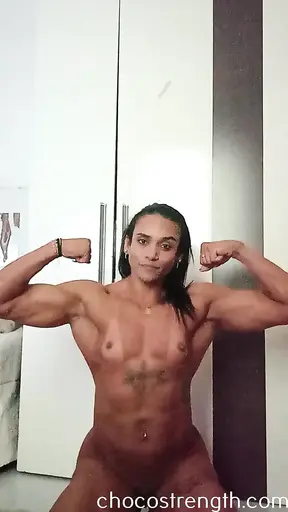 Muscle milf flexes her guns before getting pounded