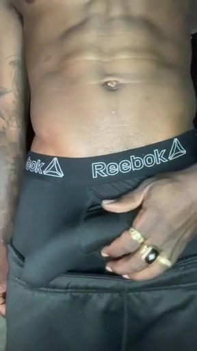 BBC in grey underwear strokes cock until he explodes on his hands