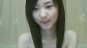 Hot and skinny Chinese brunette teen masturbating on webcam