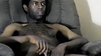 Black amateur strokes his big cock solo until he cums