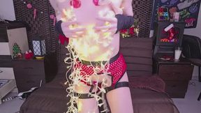 Christmas Elf Girl Playing with Fairy Lights