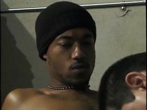 Young Hispanic male gives black dick covered in whip cream a blowjob