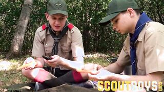 2 uniformed lad scouts pummel outdoors by campfire