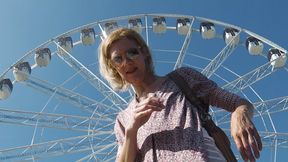 Smoking by the ferris wheel