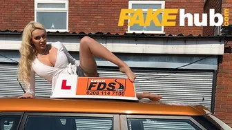 Amber Jayne takes a huge black cock in the backseat of a car