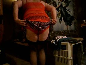 Old fucker in female clothes shows off his huge boner