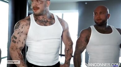 Tattooed blonde and two muscular men heat up in a modern apartment threesome