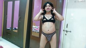 Hot crossdresser in animal print thong and black bra getting naked.