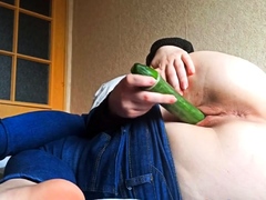 Student fucks in a hostel with a cucumber