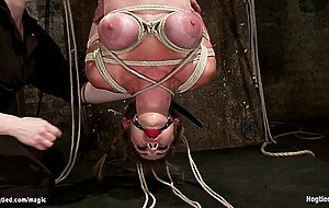 Busty lesbian slave hung for thighs