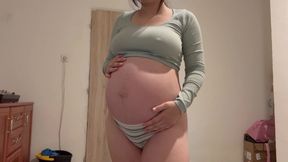 Pregnant Indian stepsister goes into the bathroom and shows off her big belly, then masturbates and plays with her pussy until she has an orgasm. She does a camel toe pussy and plays with her belly too.