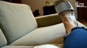 Cork slippers and bare feet posing, POV