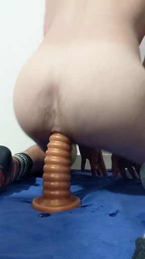 Riding a Huge Dildo