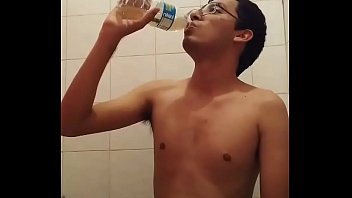 Amateur boy drinks his piss