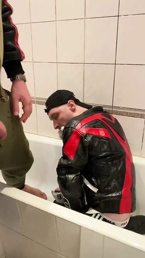 Big Man in Leather Jacket Pissing on Leather Moto Biker