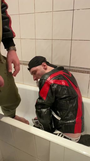 Big Man in Leather Jacket Pissing on Leather Moto Biker