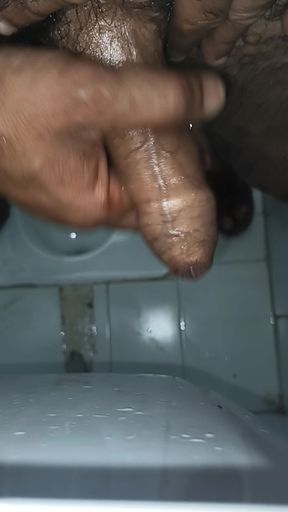 Indian middle age man massage his pennis with oil and gel