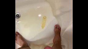 Piss in das Kondom