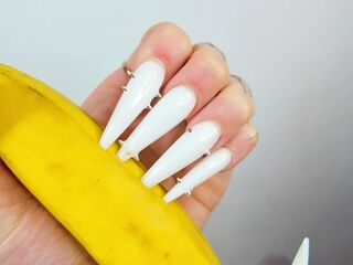 Lengthy White Nails Scratching And Destroying Banana Like Penis