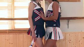 Sexy cheerleaders stimulate each other's pussies with vibrator