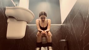 Pissing in a public toilet
