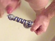 Foreskin docking/stroking using glass dildo then cum on dildo & suck clean.