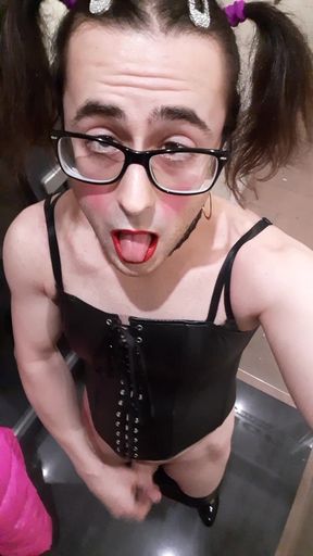 Sissyslut in front of the hotel entrance